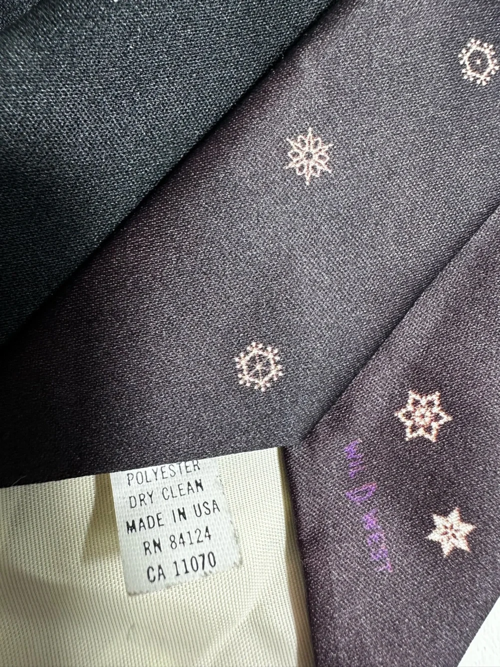 A51. Ralph Marlin Black Tie with Festive Cow and Red Accents